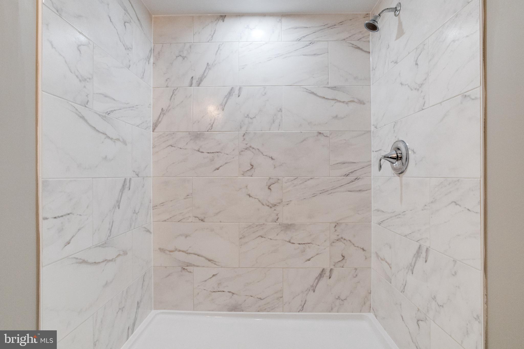 1209 Krueger Avenue Rosedale, MD 21237 - Photo 69 of 74 Full Lower Level Bath with Tile Surround