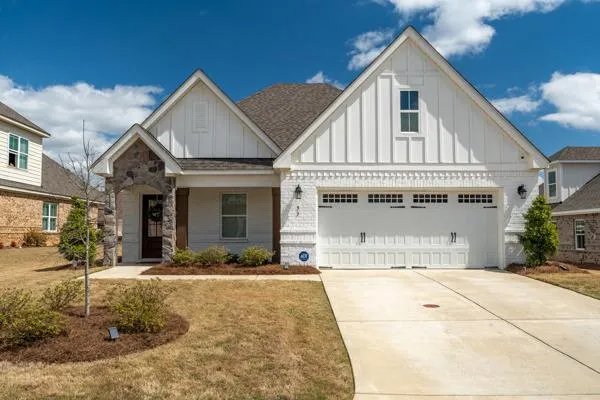 a front view of a house with a outdoor space