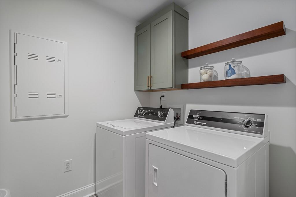 53 Hawthorne Terrace Fortson, GA 31808 - Photo 22 of 38 a utility room with dryer and washer