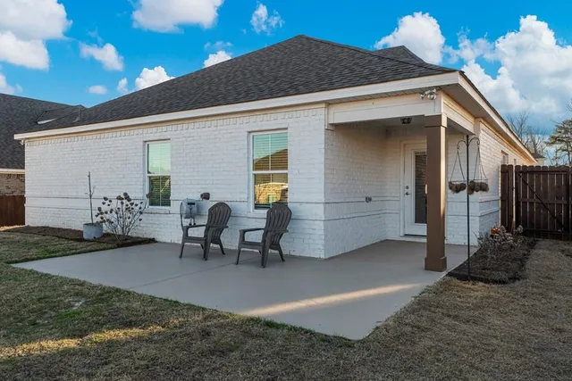 a view of a porch with furniture