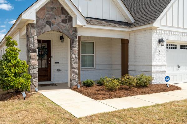 53 Hawthorne Terrace Fortson, GA 31808 - Photo 3 of 38 a front view of a house with a yard
