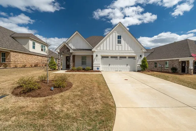 a front view of a house with a outdoor space