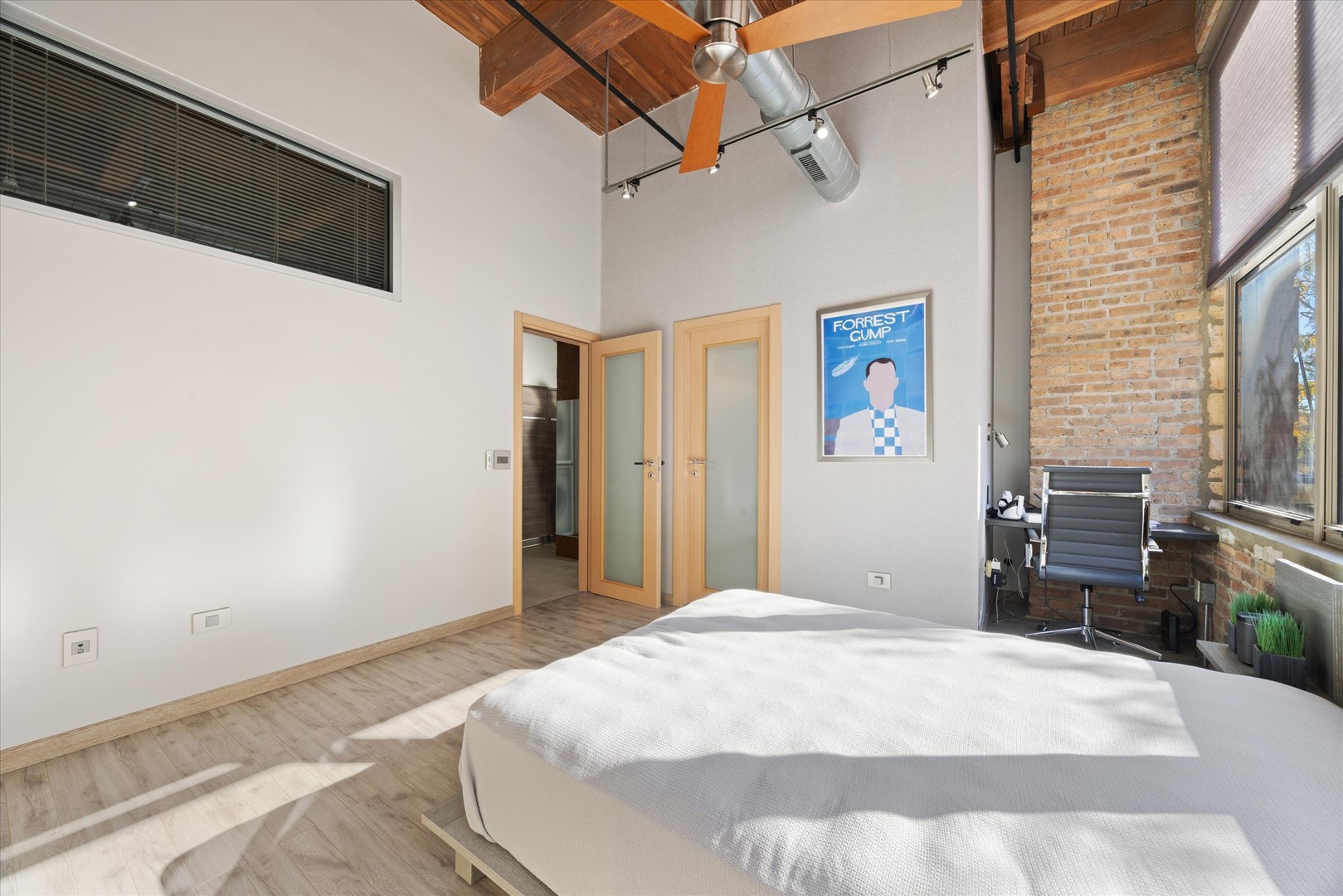 1500 West Monroe Street, Unit 220 Chicago, IL 60607 - Photo 12 of 17 a bedroom with a bed dresser and a window