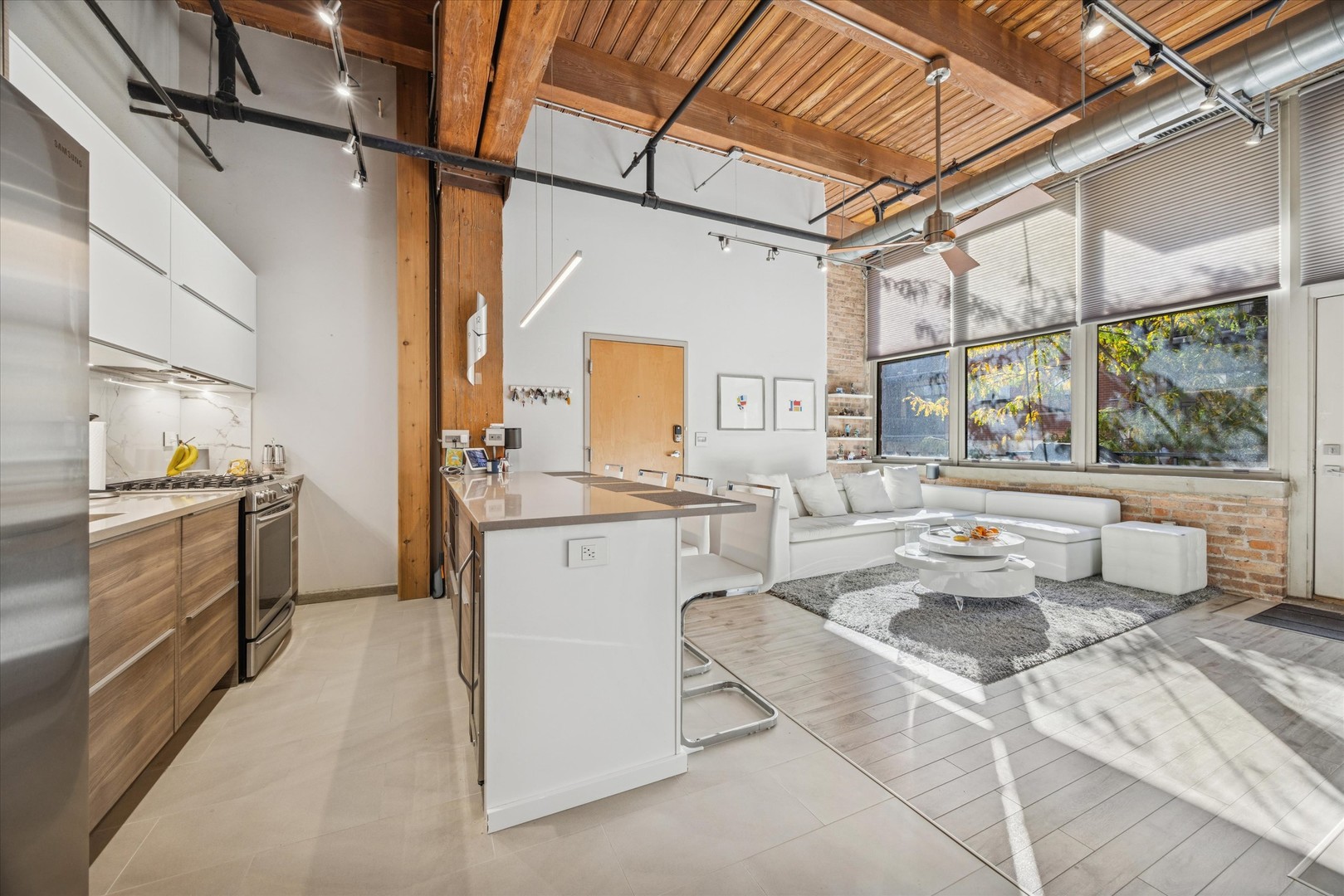 1500 West Monroe Street, Unit 220 Chicago, IL 60607 - Photo 7 of 17 a kitchen with sink and refrigerator