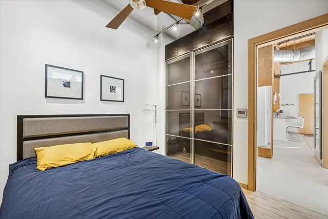 a room with a bed and a view of bathroom