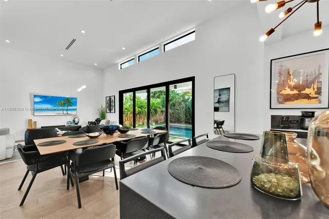 a room with furniture and a large window