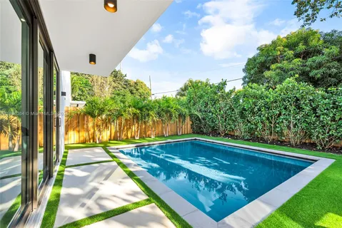 a view of a backyard with plants