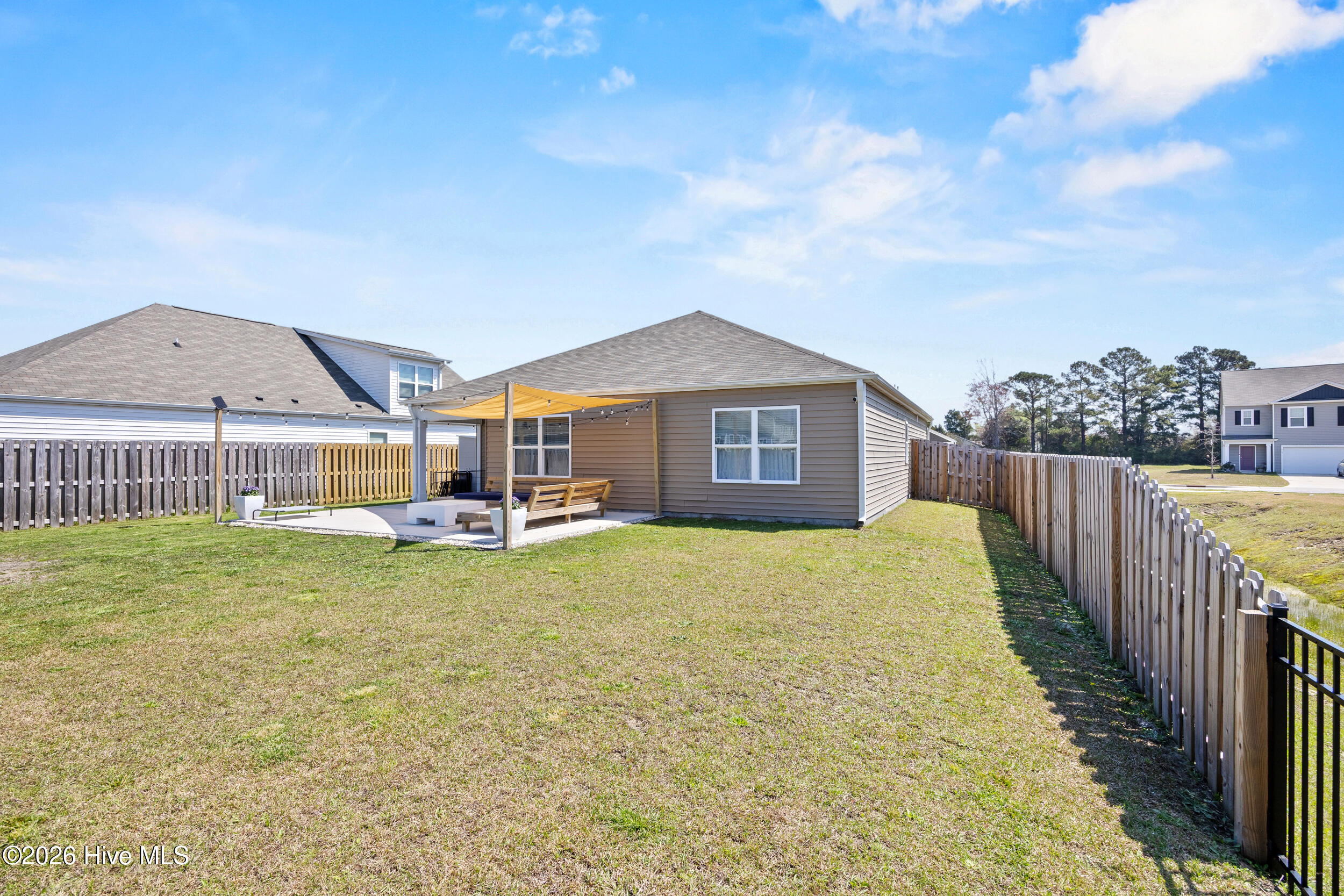 110 Cassidy Lane, Unit 63 Holly Ridge, NC 28445 - Photo 39 of 49 39_back exterior