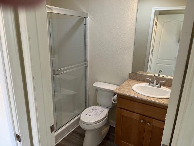 314 South Main Street, Unit 70 Angels Camp, CA 95222 - Photo 7 of 9 a bathroom with a toilet sink vanity and shower