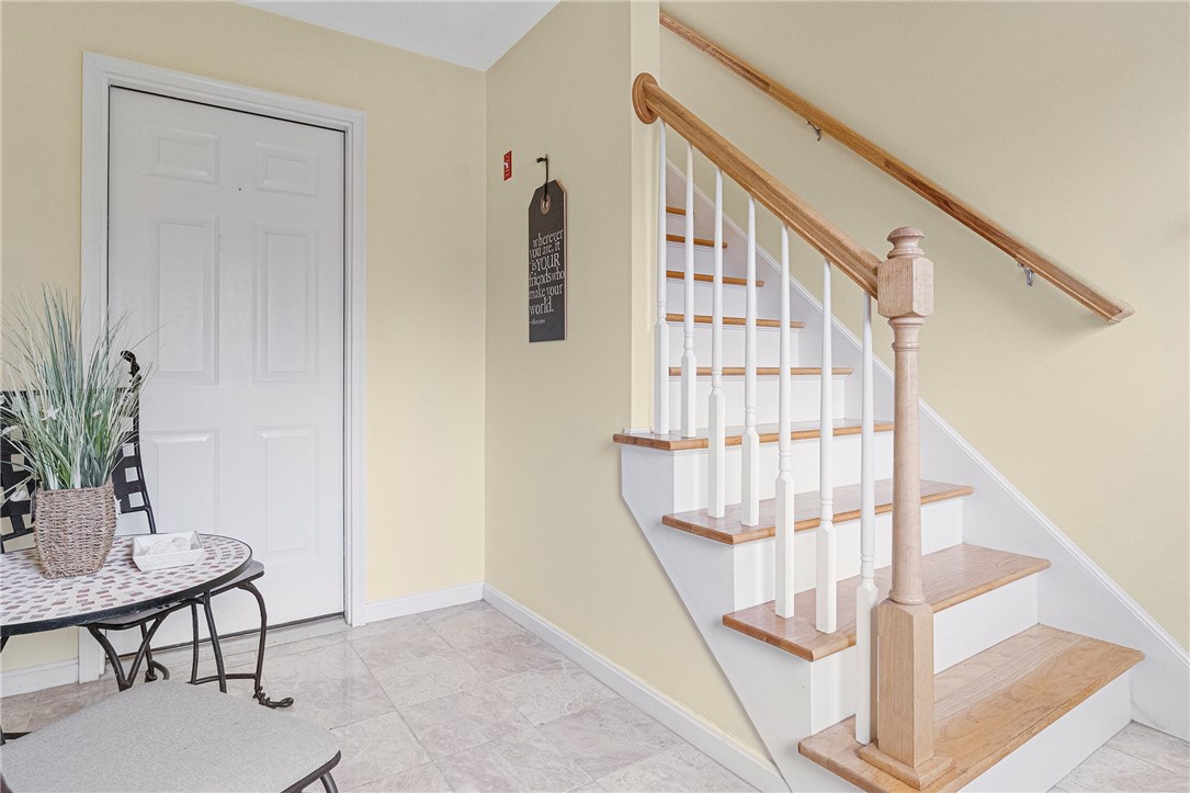 1 Meadow Road Narragansett, RI 02882 - Photo 6 of 50 Come on in to this cheery entry way. There is a large storage/utility room behind the door shown in photo., the garage is to the left (not shown in photo).
