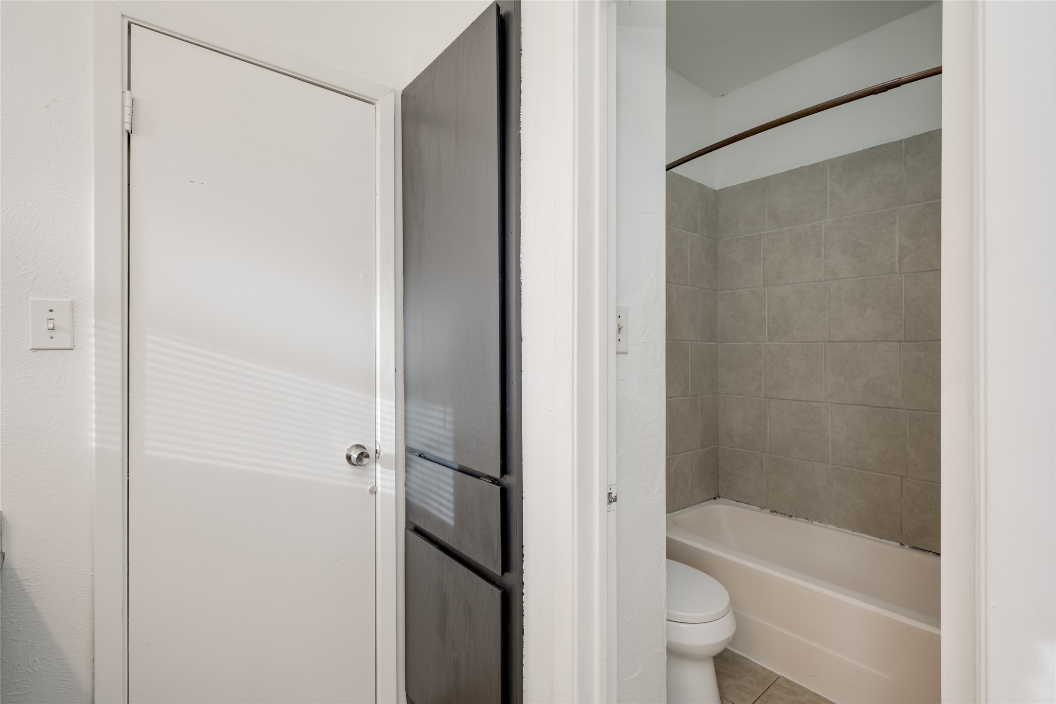 5304 Indio Cove, Unit B Austin, TX 78745 - Photo 19 of 40 a bathroom with a shower and a toilet