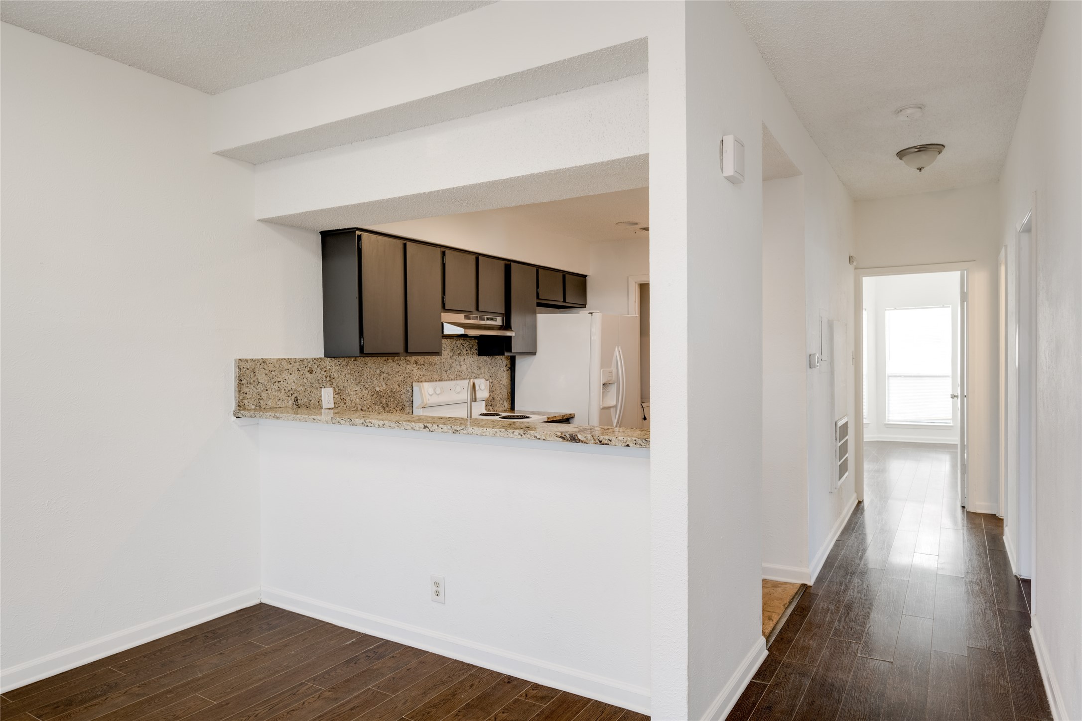 5304 Indio Cove, Unit B Austin, TX 78745 - Photo 8 of 40 a view of a kitchen cabinets and wooden floor