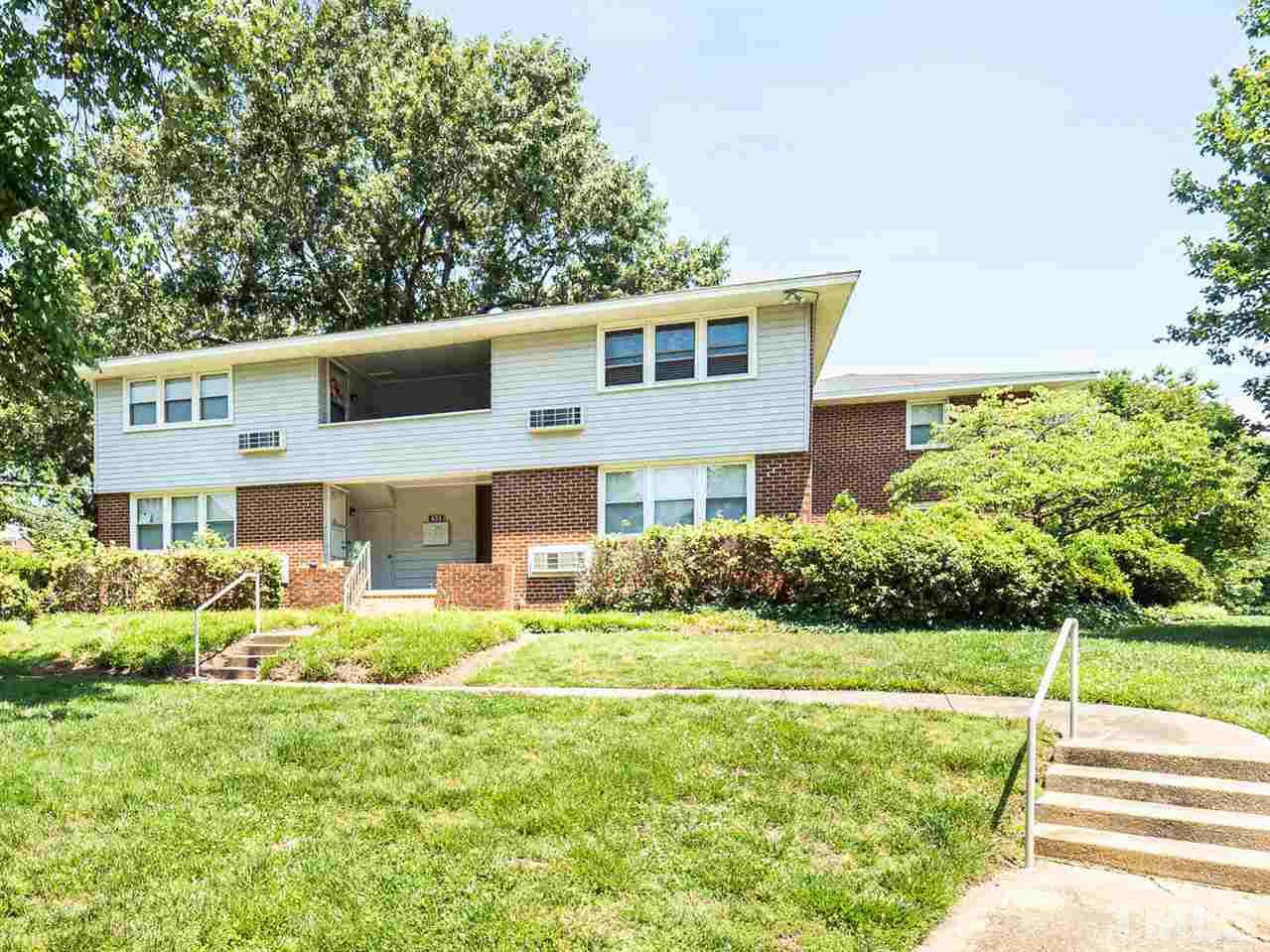 633 Daniels Street, Unit D Raleigh, NC 27605 - Photo 2 of 14 a front view of house with yard and green space