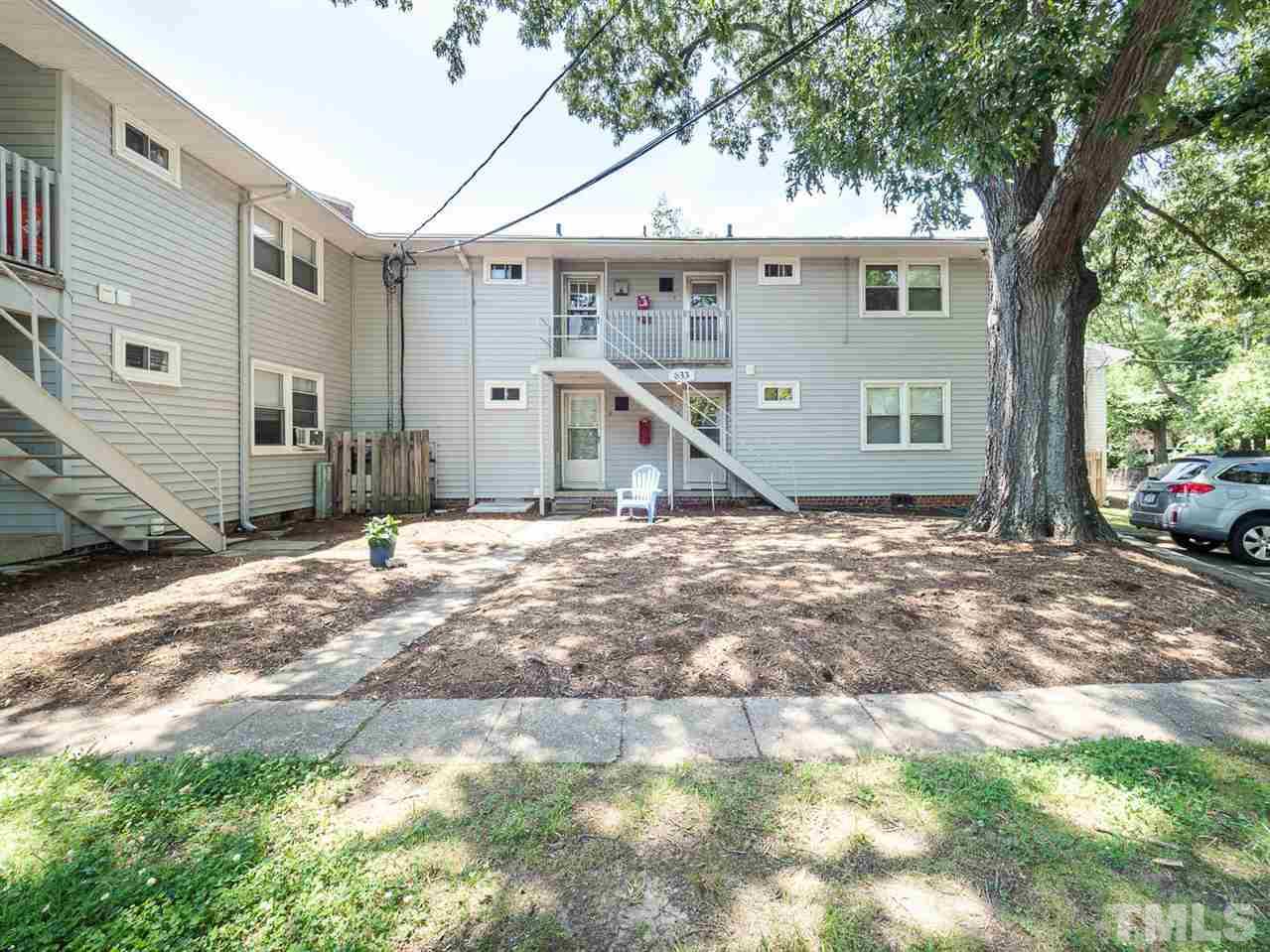 633 Daniels Street, Unit D Raleigh, NC 27605 - Photo 13 of 14 a view of a house with a patio