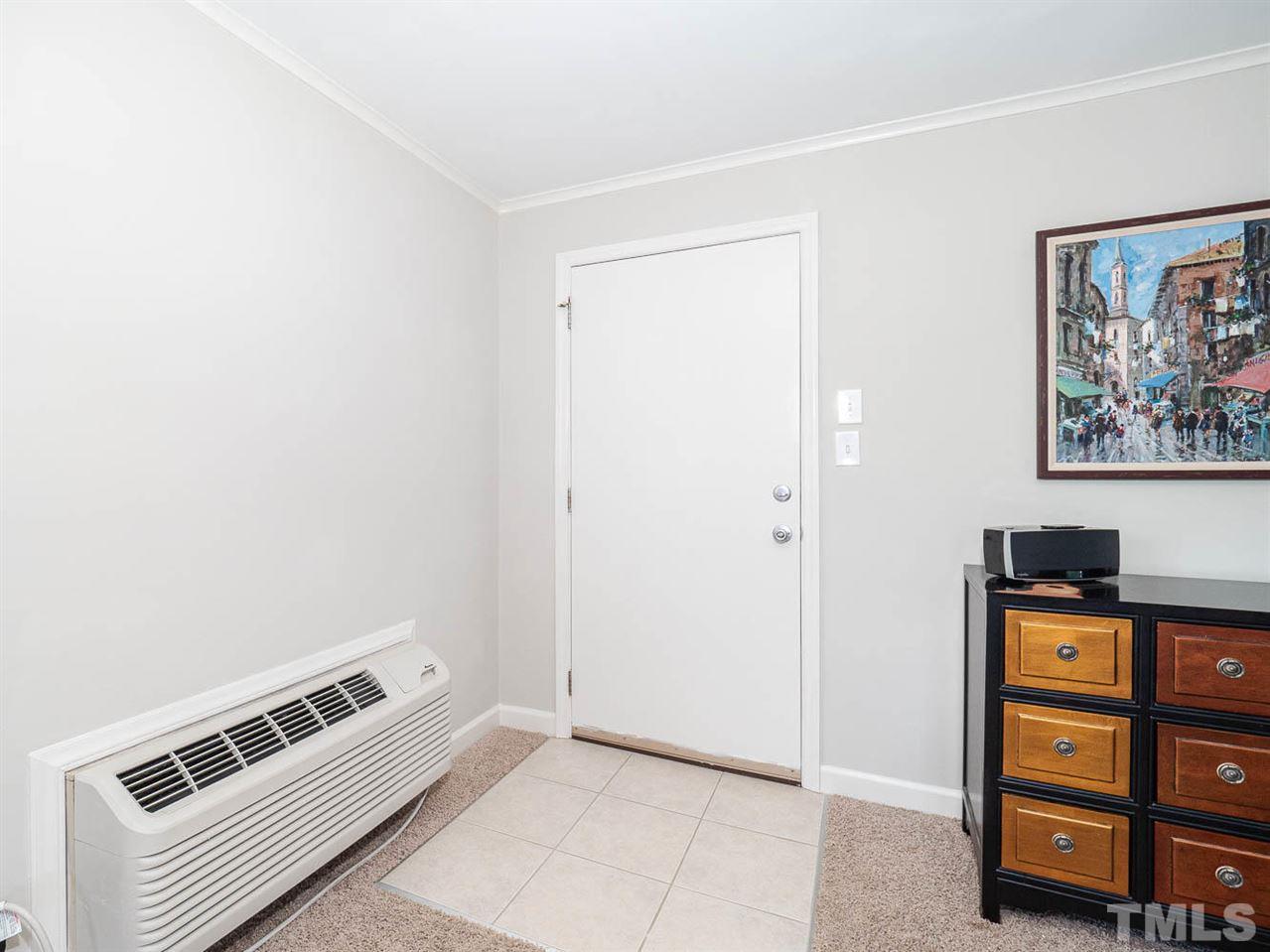 633 Daniels Street, Unit D Raleigh, NC 27605 - Photo 5 of 14 a view of an empty room