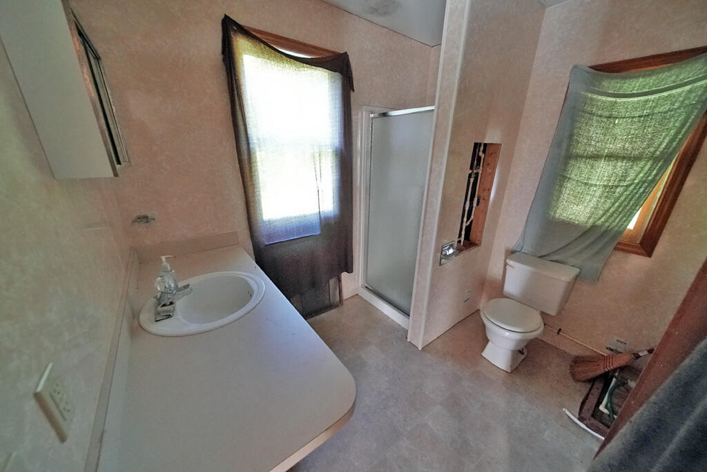 614 Shin Pond Road Patten, ME 04765 - Photo 19 of 51 maine-cabin-bathroom
