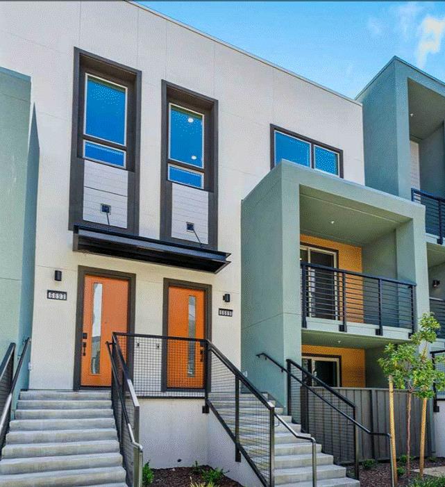 a view of front door of house with stairs