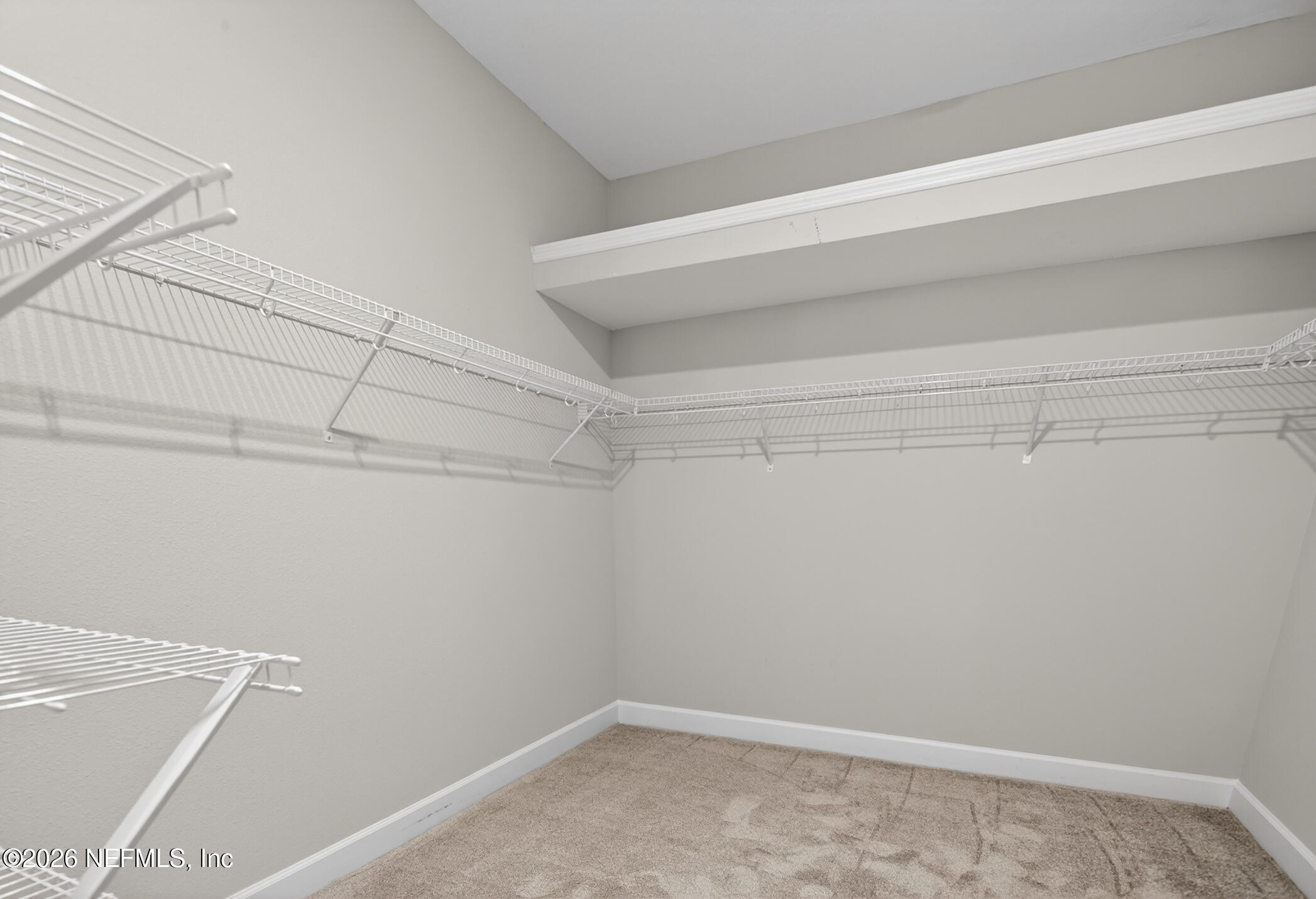 237 Windswept Way Street St. Augustine, FL 32092 - Photo 32 of 136 a view of a room with racks on the wall