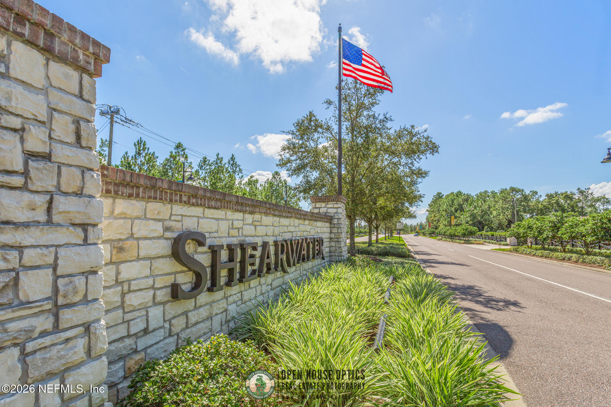 237 Windswept Way Street St. Augustine, FL 32092 - Photo 49 of 136 a street sign on a sidewalk next to a building
