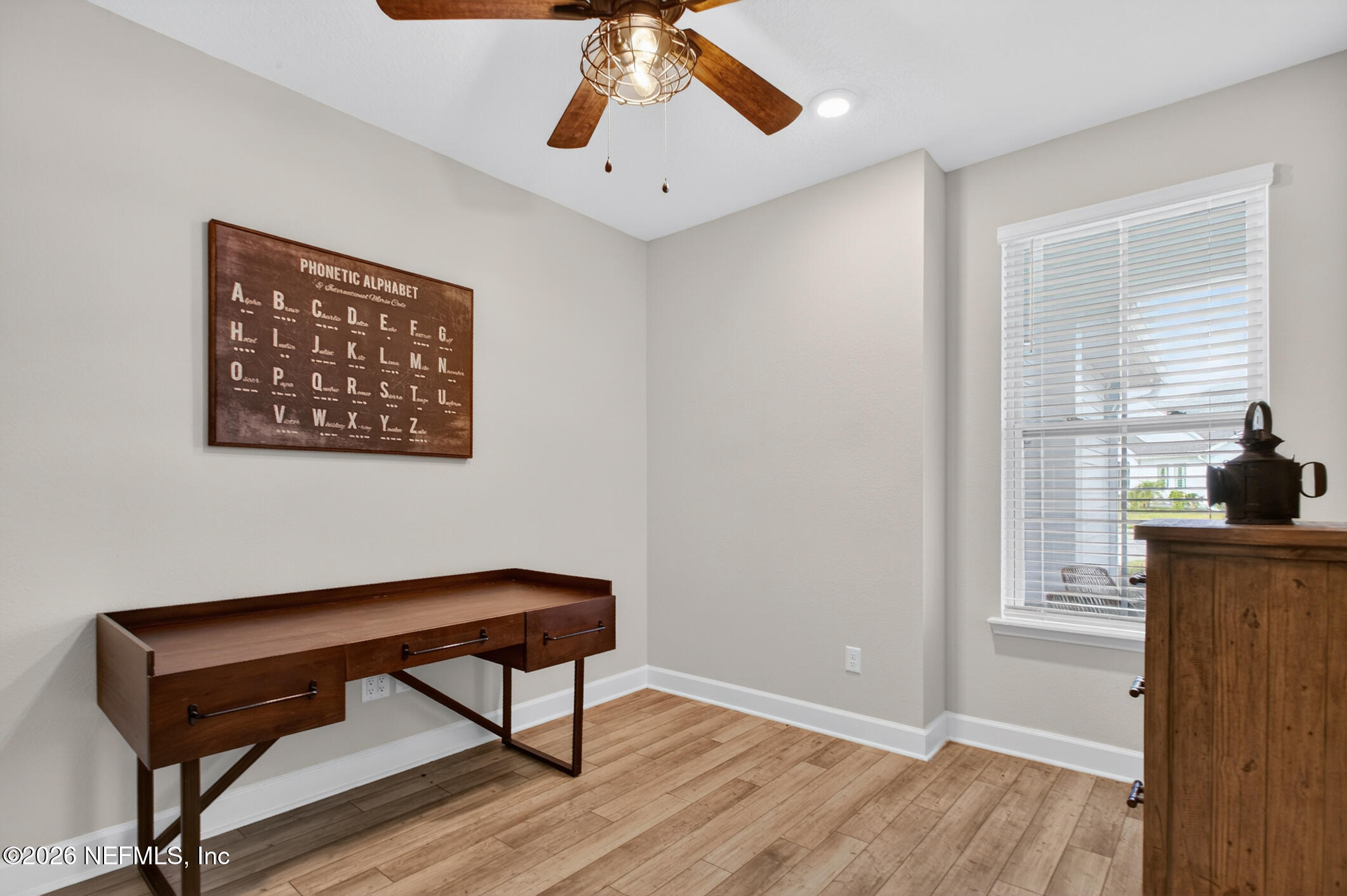 237 Windswept Way Street St. Augustine, FL 32092 - Photo 10 of 136 a view of a livingroom with furniture and wooden floor
