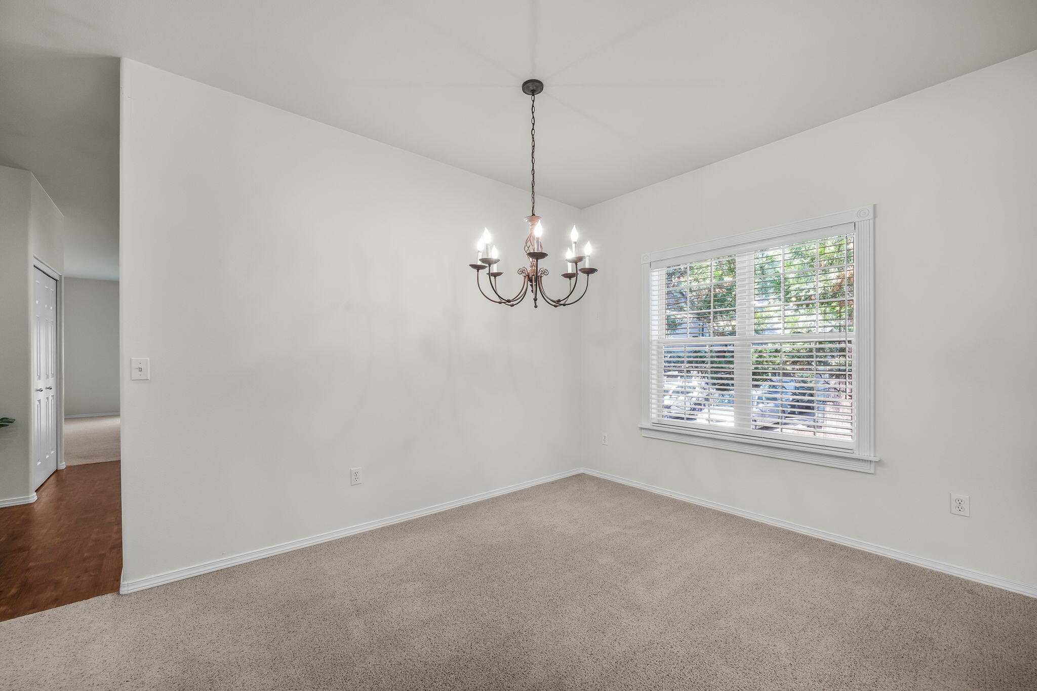 61311 Southwest Brookside Loop Bend, OR 97702 - Photo 5 of 30 Area dining large enough for chandelier centered table for six, or cozy enough for a table for four.
