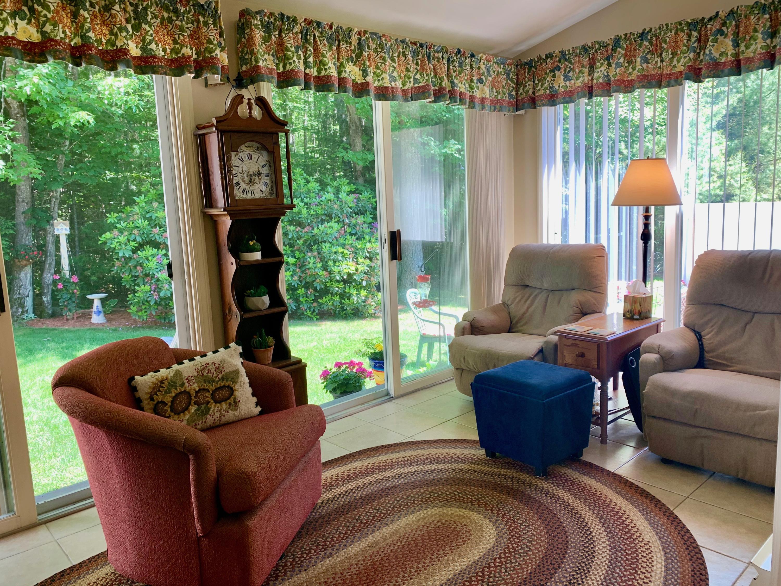 226 Flintlock Village Road, Unit 3 Wells, ME 04090 - Photo 11 of 27 Screened In Porch