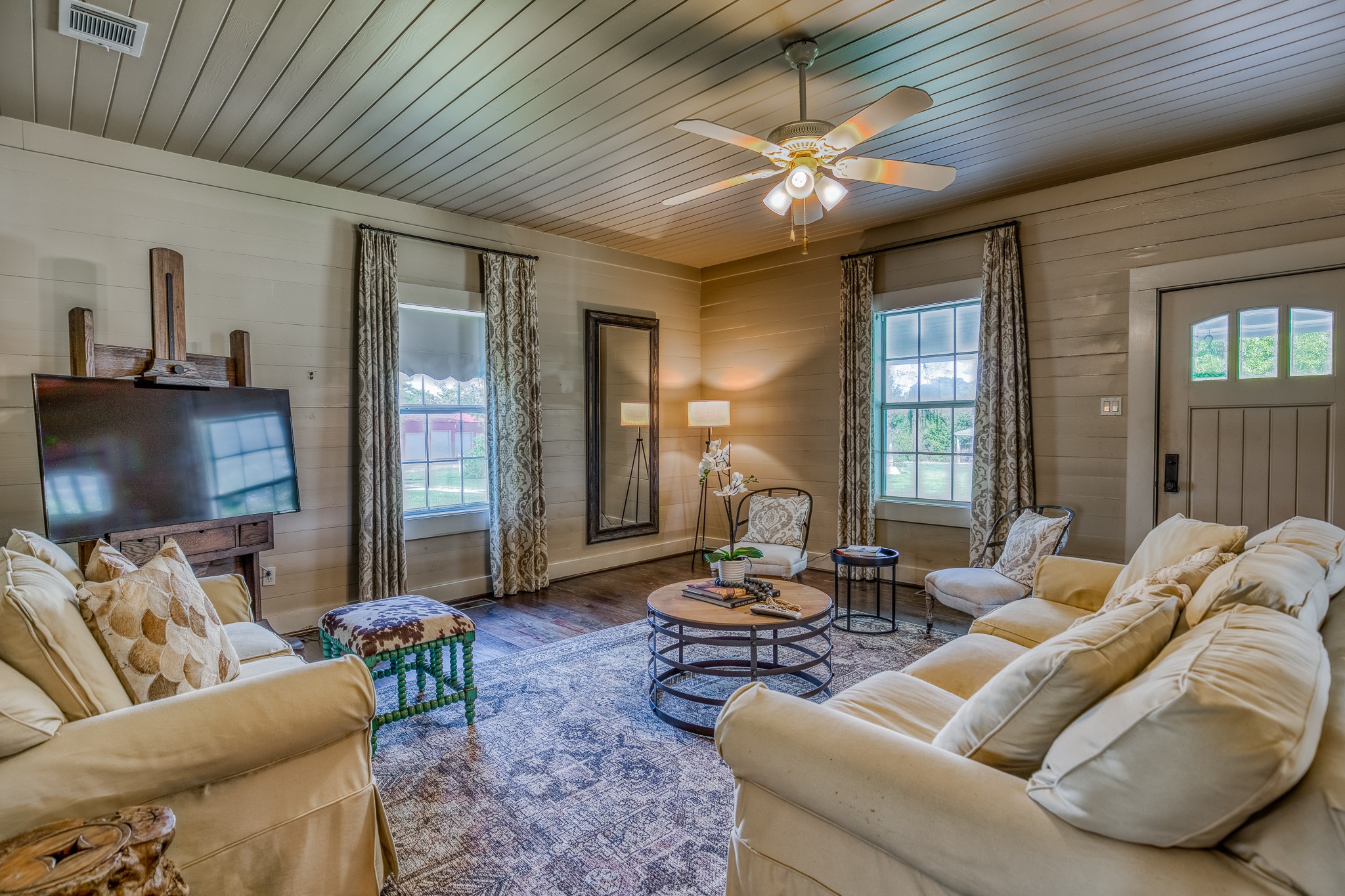 4825 Mt Vernon Road Brenham, TX 77833 - Photo 17 of 30 a living room with furniture and a chandelier
