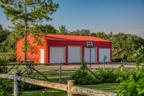 a view of a house with big yard
