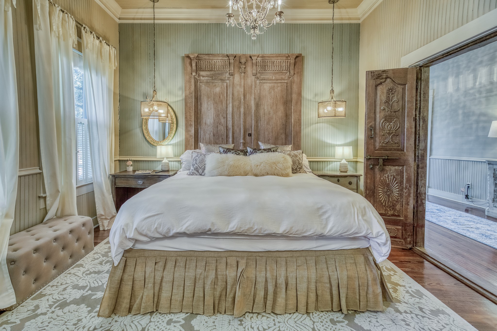 4825 Mt Vernon Road Brenham, TX 77833 - Photo 9 of 30 a bedroom with a bed and a chandelier