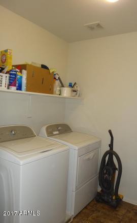 11026 West Elm Street Phoenix, AZ 85037 - Photo 11 of 20 a utility room with dryer and washer
