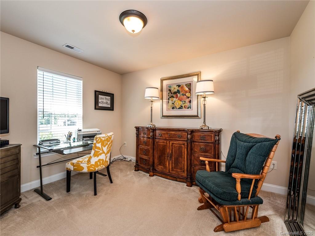 2910 Ruben Road Monroe, NC 28112 - Photo 21 of 29 a living room with furniture and a window