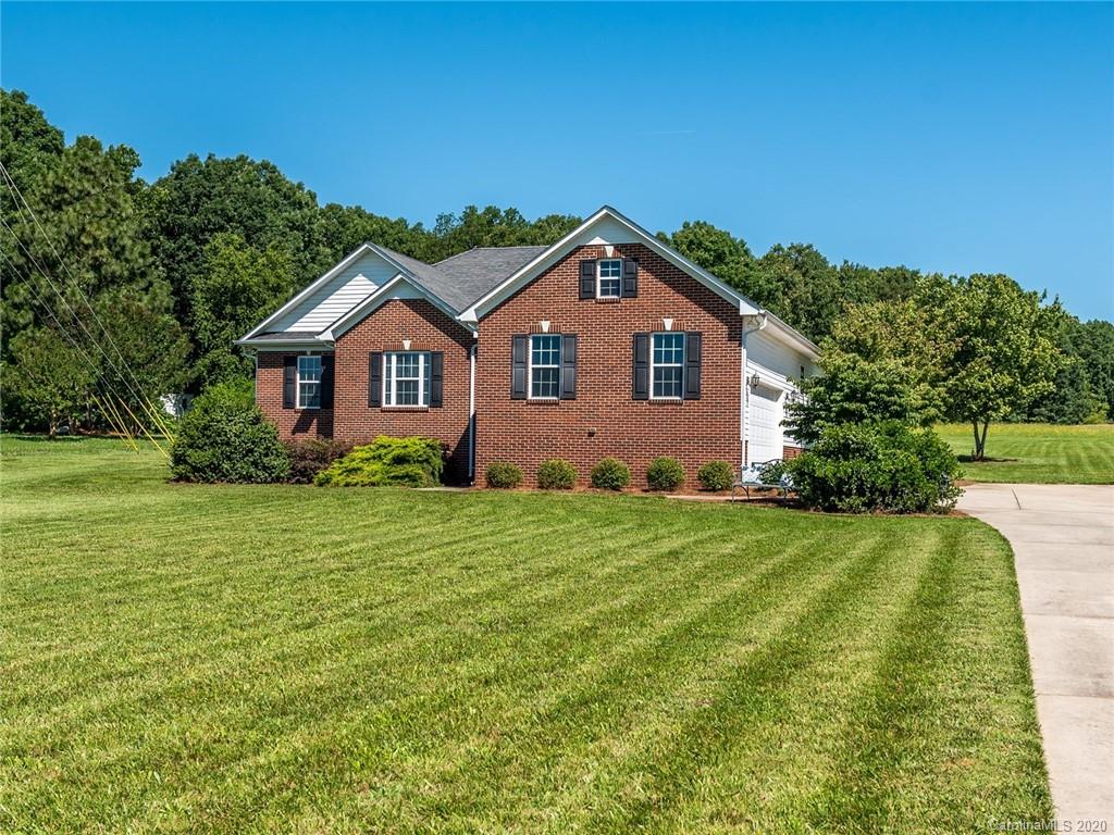 2910 Ruben Road Monroe, NC 28112 - Photo 28 of 29 a front view of a house with a yard