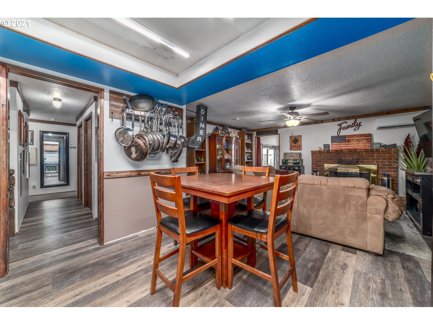 471 67th Street Springfield, OR 97478 - Photo 12 of 28 a dining room with furniture and wooden floor