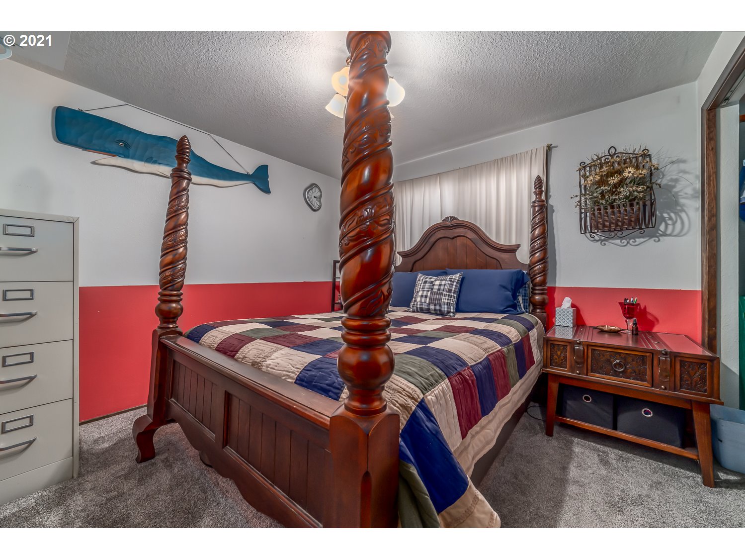 471 67th Street Springfield, OR 97478 - Photo 19 of 28 a bedroom with a bed and a baby on the dresser