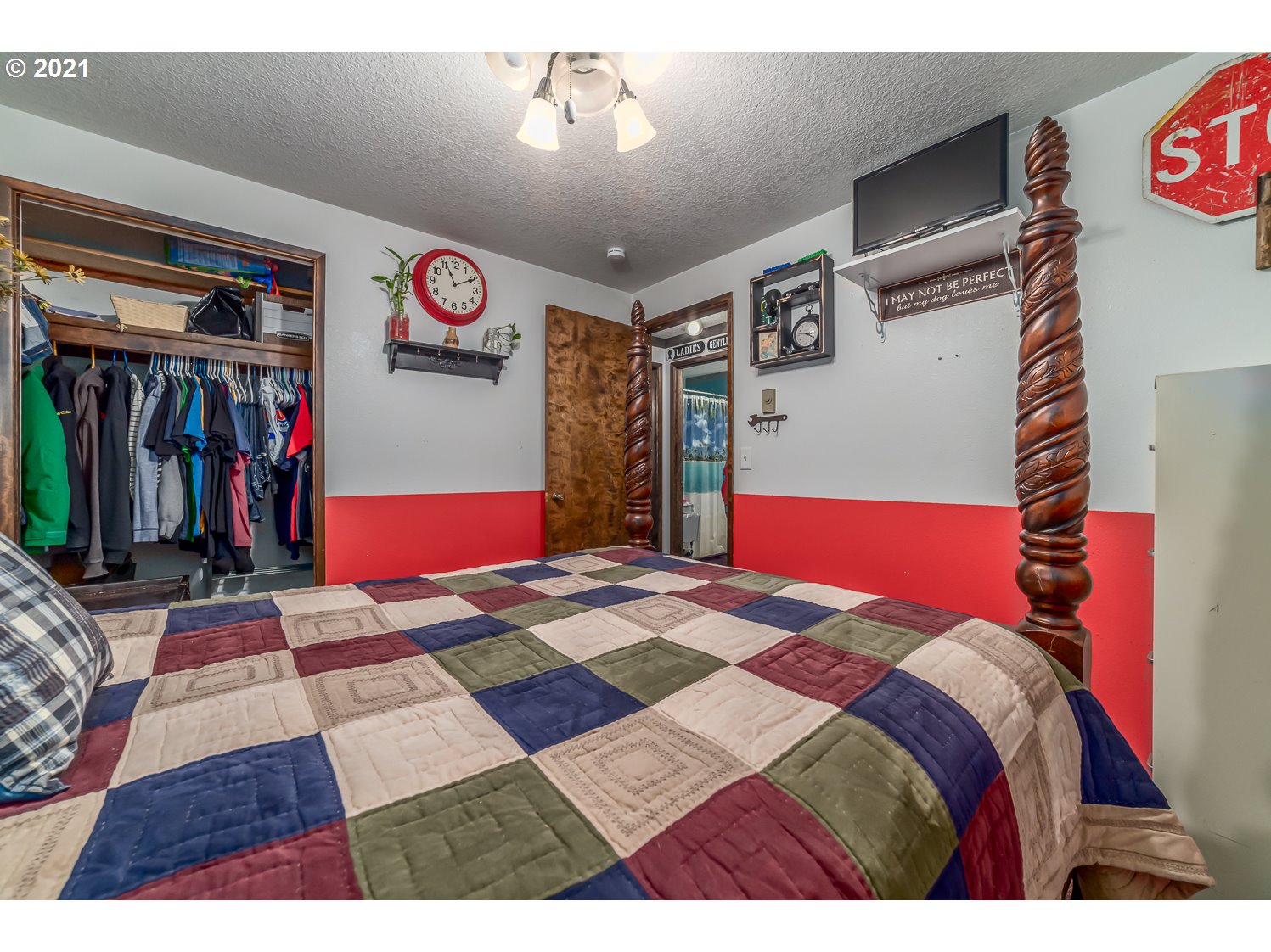 471 67th Street Springfield, OR 97478 - Photo 20 of 28 a bedroom with a bed and a book shelf