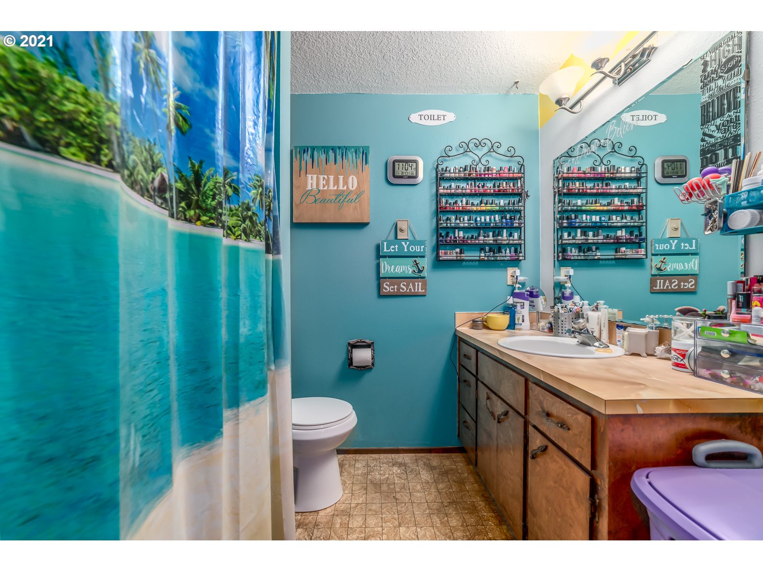 471 67th Street Springfield, OR 97478 - Photo 21 of 28 a utility room with a sink a toilet and garden