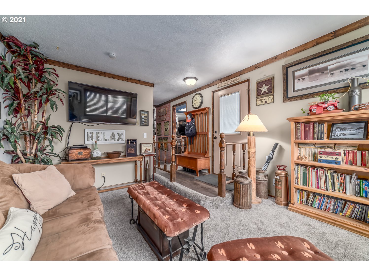 471 67th Street Springfield, OR 97478 - Photo 5 of 28 a living room with furniture and a flat screen tv