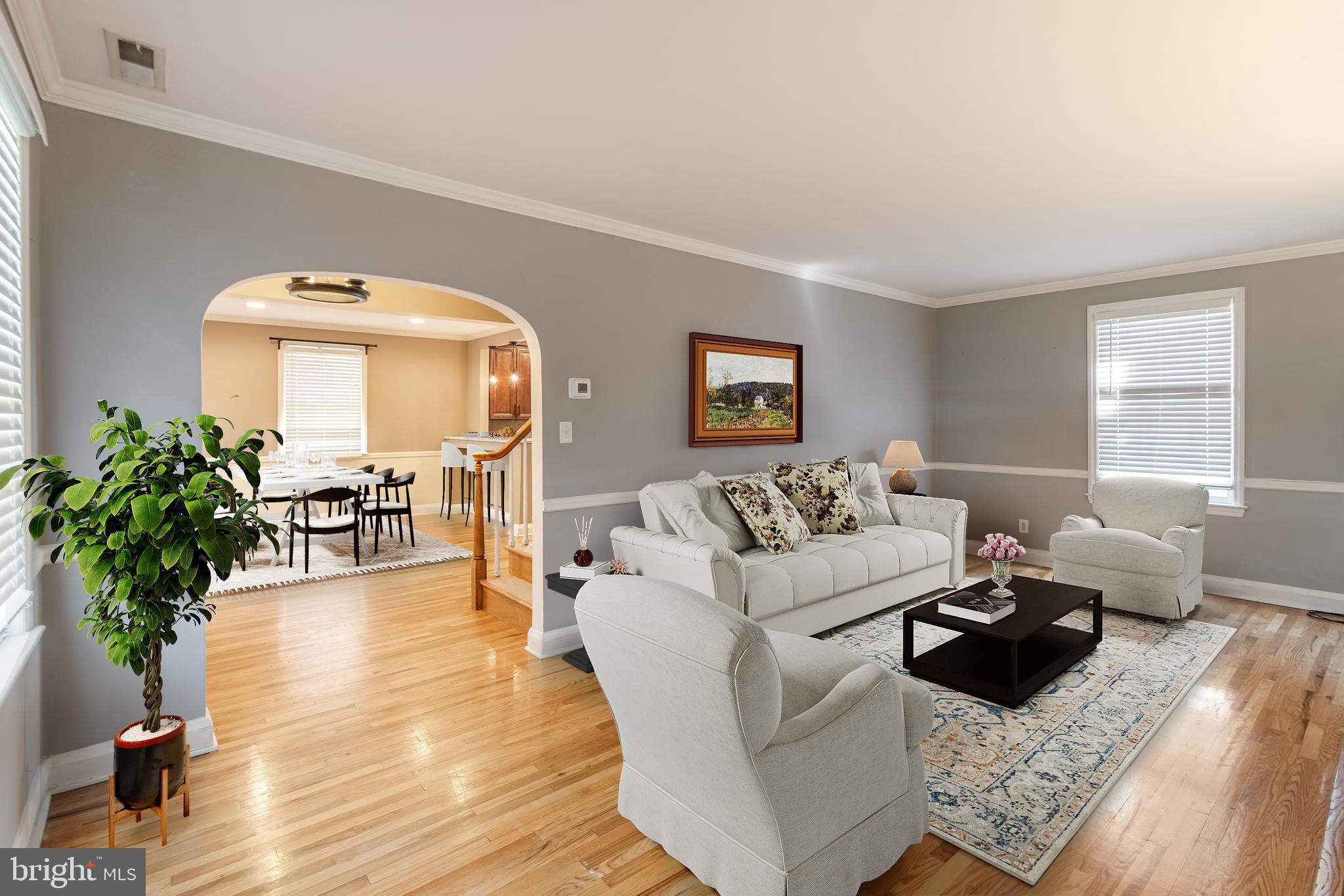 113 Homewood Road Linthicum Heights, MD 21090 - Photo 11 of 34 a living room with furniture and a large window