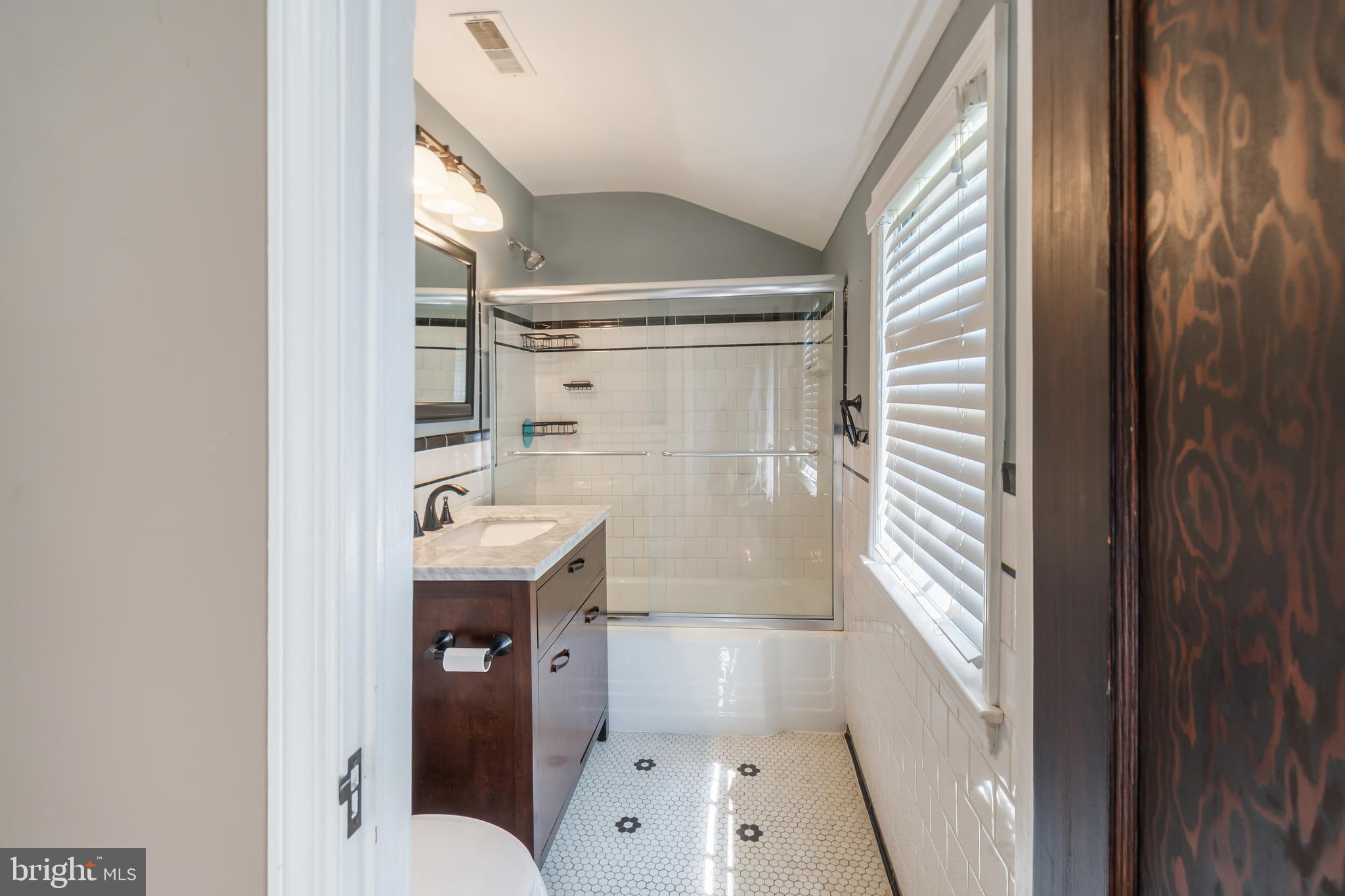 113 Homewood Road Linthicum Heights, MD 21090 - Photo 19 of 34 a bathroom with a sink a toilet and shower