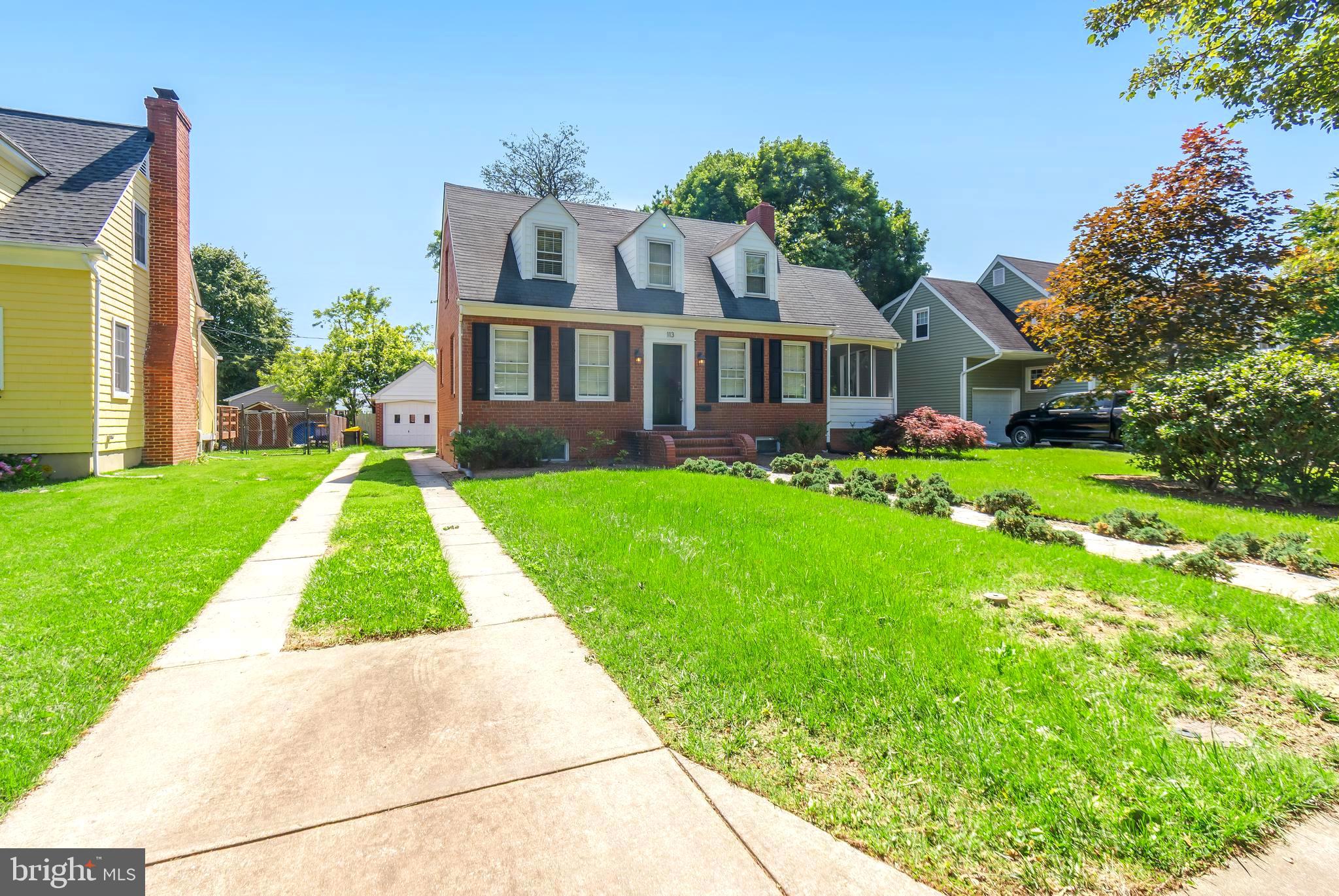 113 Homewood Road Linthicum Heights, MD 21090 - Photo 2 of 34 a front view of a house with a yard