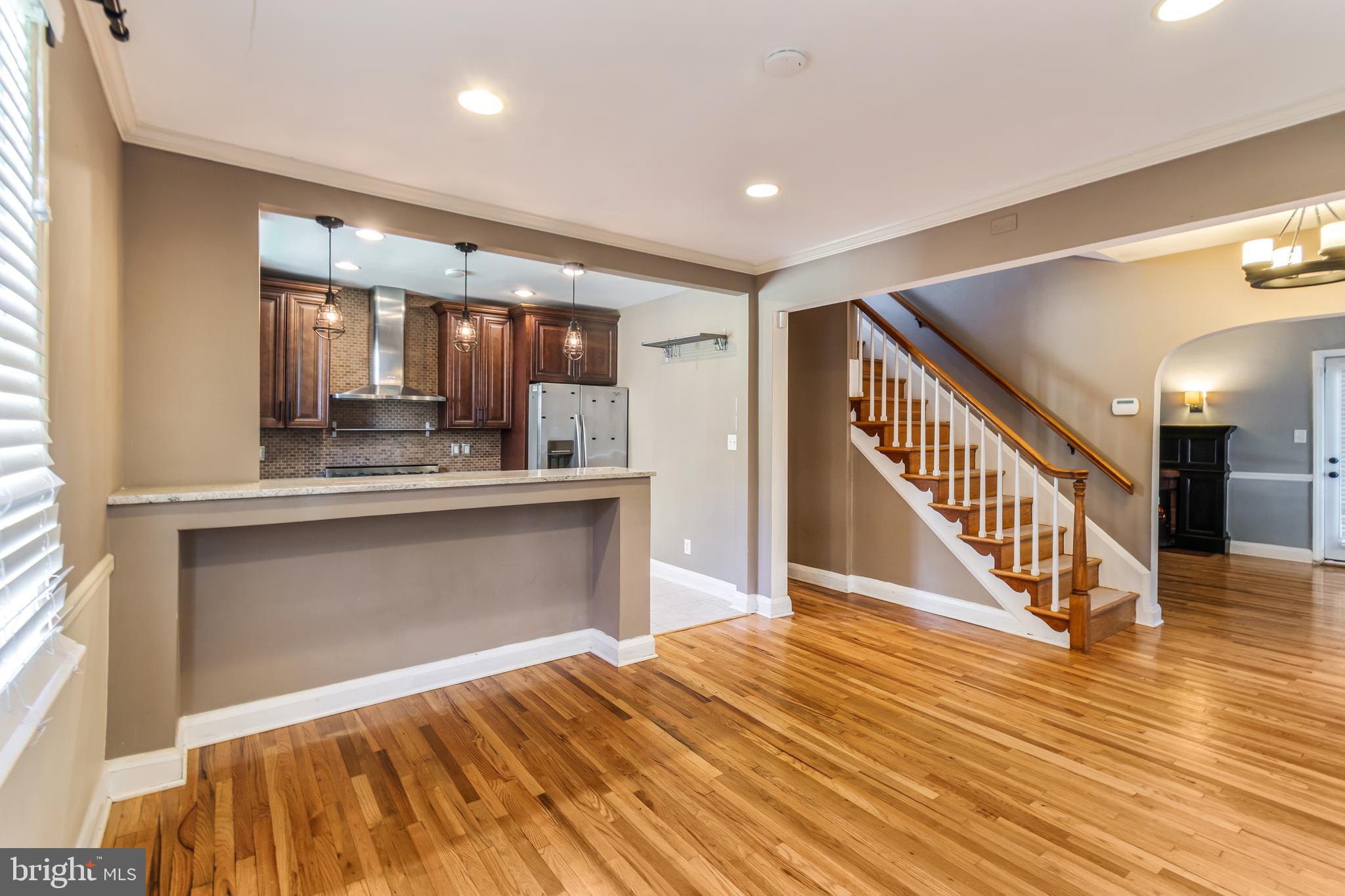 113 Homewood Road Linthicum Heights, MD 21090 - Photo 7 of 34 a view of kitchen with wooden floor and electronic appliances
