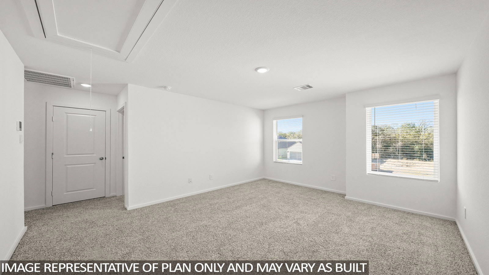 116 Baby Calf Roping Road Jarrell, TX 76537 - Photo 12 of 23 An airy secondary bedroom boasts soft carpeting and two well-lit windows overlooking natural scenery.