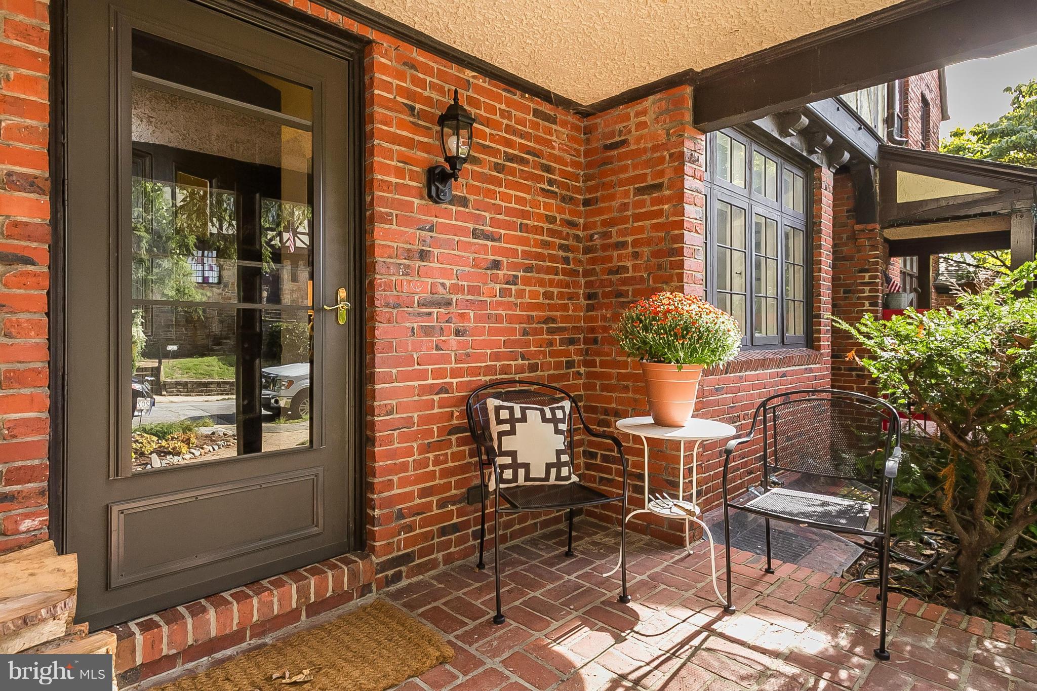 207 Ridgemede Road Baltimore, MD 21210 - Photo 3 of 30 a view of a chairs and table in a patio