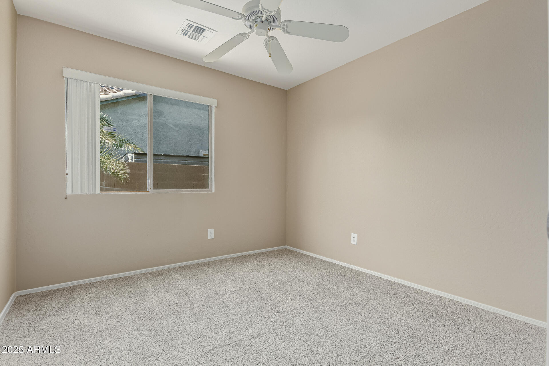 315 South 112th Drive Avondale, AZ 85323 - Photo 15 of 20 an empty room with a window