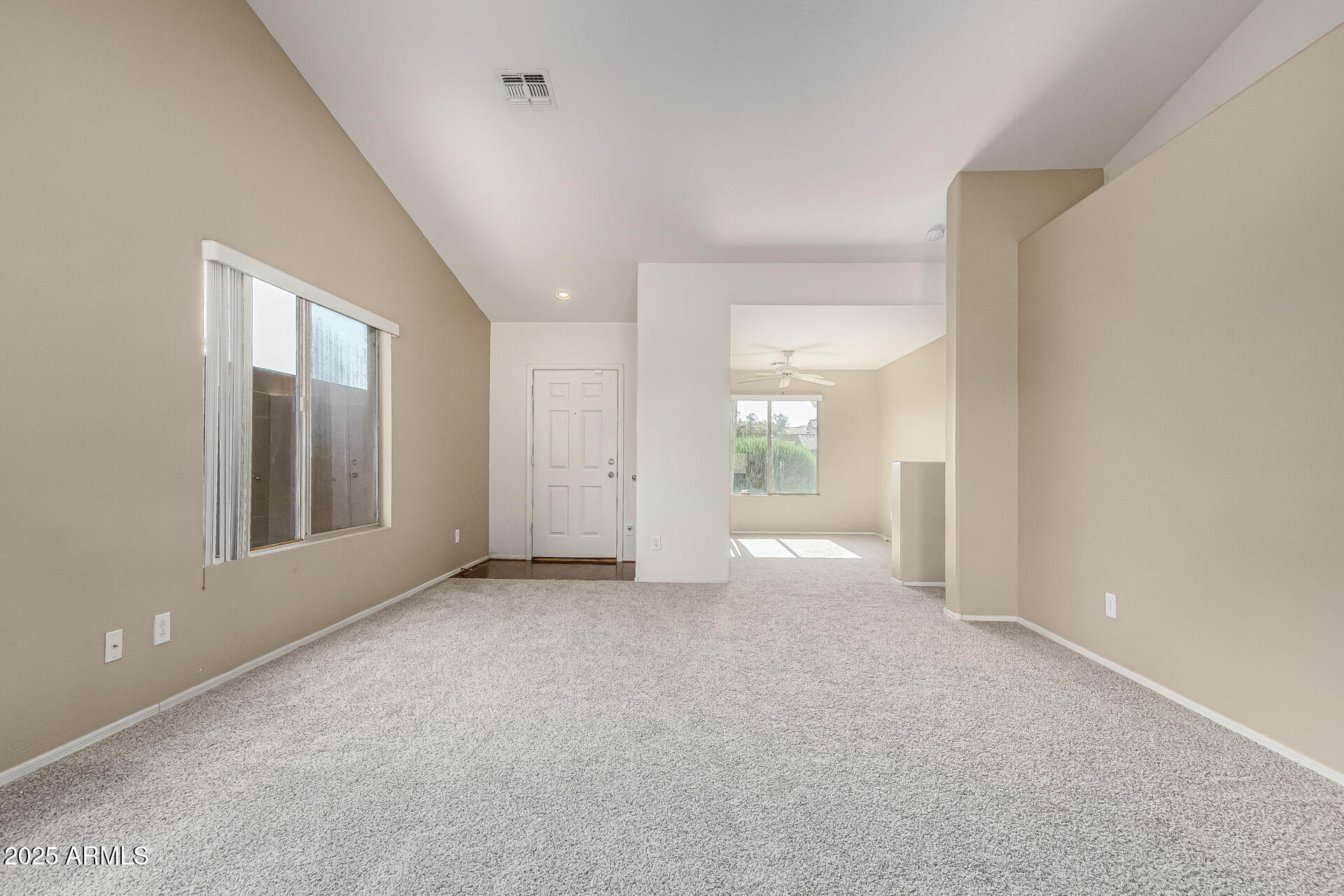 315 South 112th Drive Avondale, AZ 85323 - Photo 5 of 20 a view of an empty room with a window
