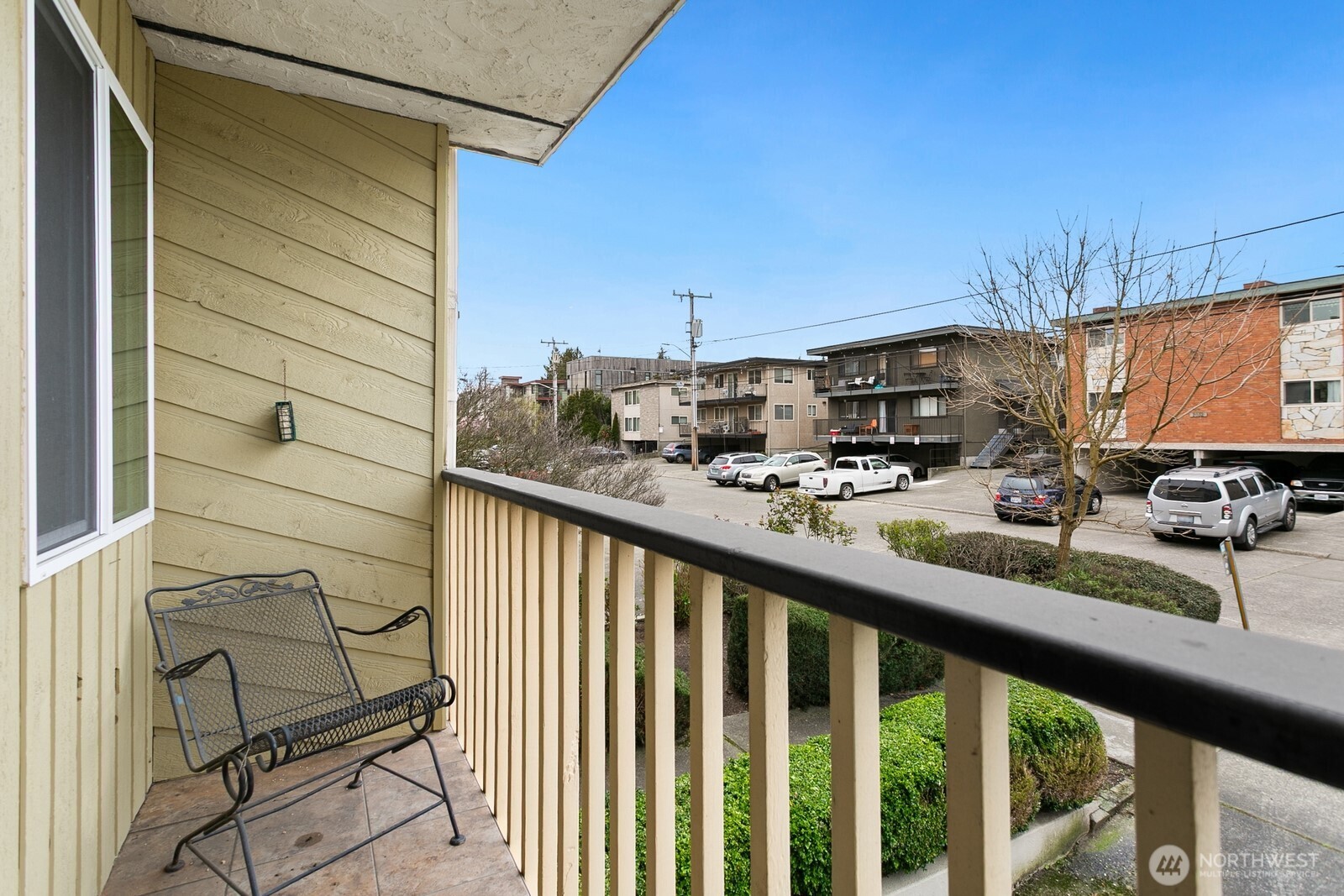 2031 Northwest 59th Street, Unit 101 Seattle, WA 98107 - Photo 21 of 22 a view of a street from a balcony