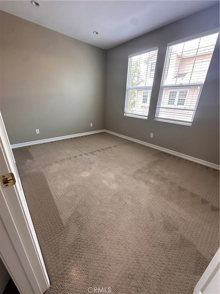 51 Ethereal Ladera Ranch, CA 92694 - Photo 11 of 14 an empty room with windows