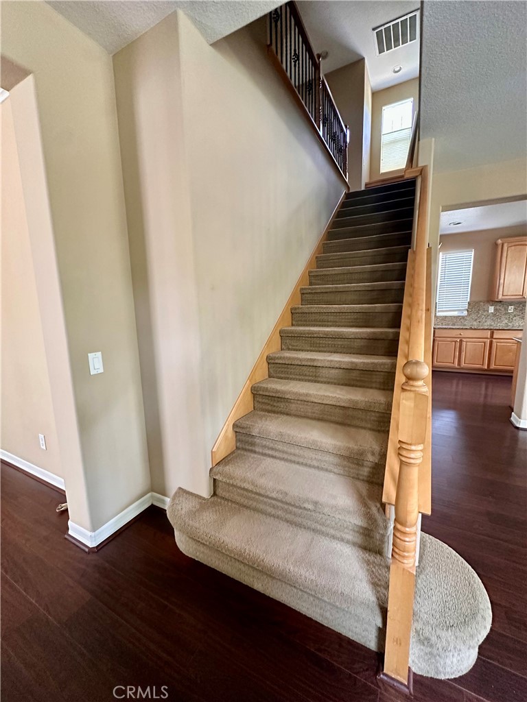 51 Ethereal Ladera Ranch, CA 92694 - Photo 7 of 14 a view of entryway with wooden floor