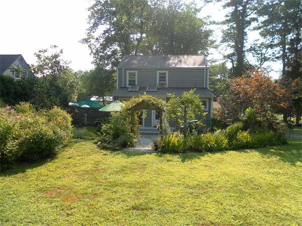 91 Parker Road Lancaster, MA 01523 - Photo 6 of 12 a front view of a house with a yard