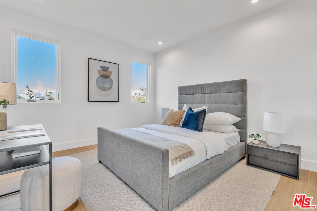 1071 Marco Place Venice, CA 90291 - Photo 18 of 39 a bed room with a bed and a couch